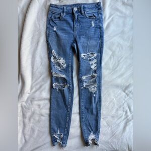 American Eagle Outfitters Next Level Stretch High Waisted Ripped Skinny Jeans